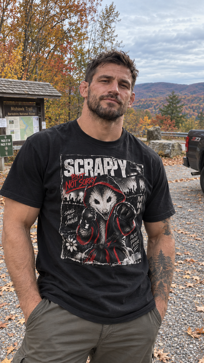 Funny opossum MMA T-shirt shown on a male model in a casual outdoor fall setting.