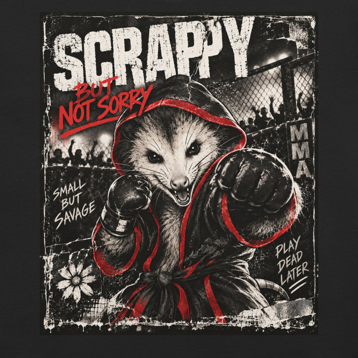 A rectangular graphic print featuring a stylized illustration of an opossum in a red hooded robe with boxing gloves, set against an MMA/fight scene. Large distressed text reads “SCRAPPY” at the top, with additional phrases including “BUT NOT SORRY,” “SMALL BUT SAVAGE,” and “PLAY DEAD LATER.
