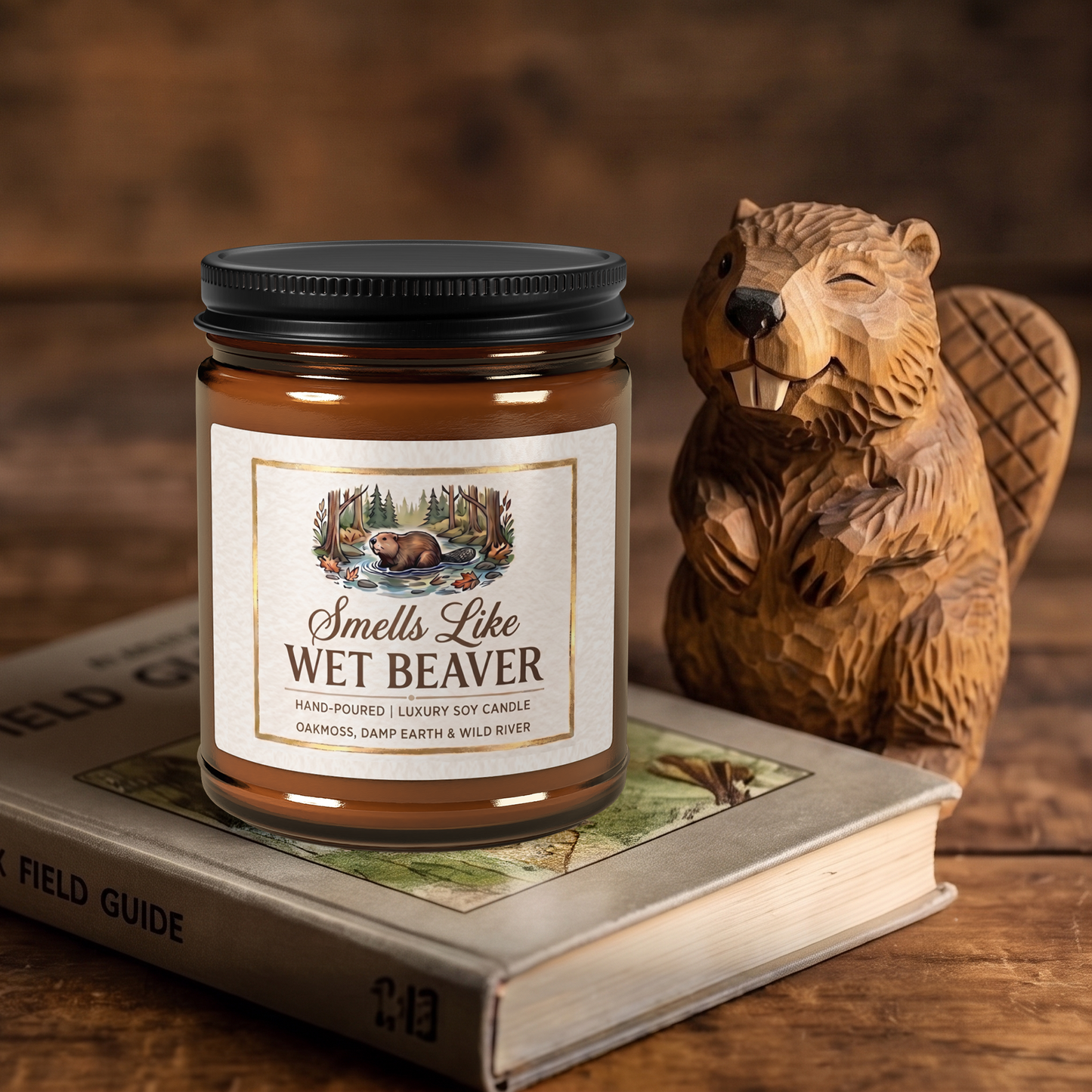 Candle labeled 'Smells Like Wet Beaver' on an open book with a wooden beaver figurine.