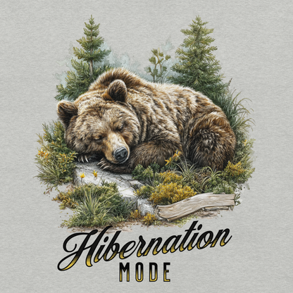 Tee featuring a Sleeping bear surrounded by trees and plants with 'Hibernation Mode' text 